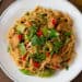 A photo of my Chicken Stir-Fry with Noodles recipe with chop sticks in the background
