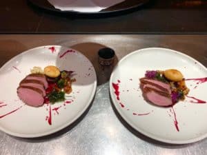 A snap of my restaurant food containing Salt Aged Duck Breast - Beetroot, Duck Fat Potato, Pickled Gorillas & Mixed Kale