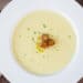 A top shot photo of my Cauliflower Soup recipes with a grilled lemon & nutmeg