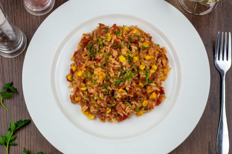 corned beef and rice on a white plate