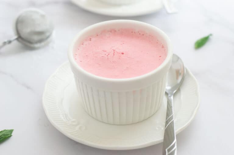 Frozen strawberry mousse in white ramekin