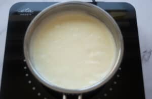 Bringing creme brûlée mixture to a light simmer