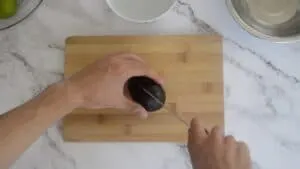 Cutting a avocado using a bridge grip