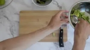 Scooping out the avocado stalk