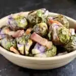 a bowl of pancetta and sprouts