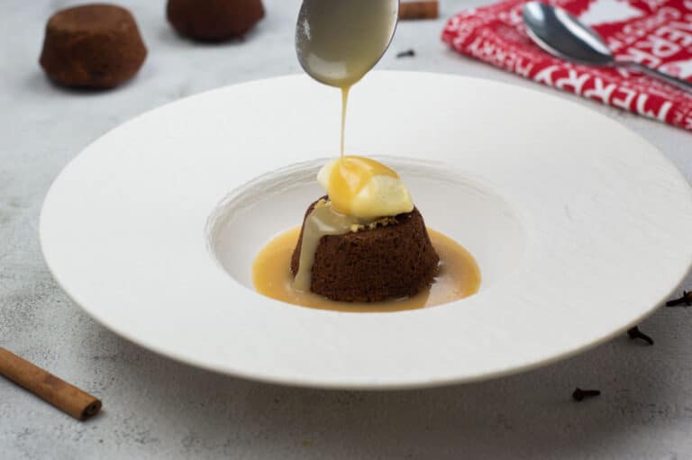 Sticky toffee pudding with spiced toffee sauce and ice cream