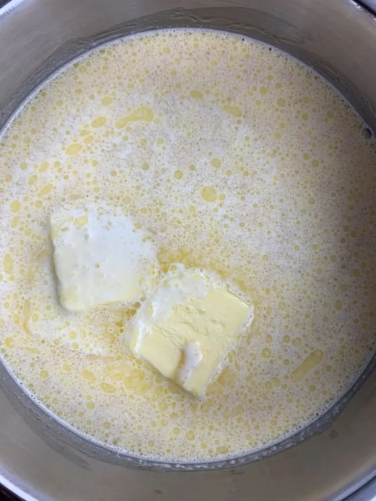 Cream, sugar and butter mixture being heated up