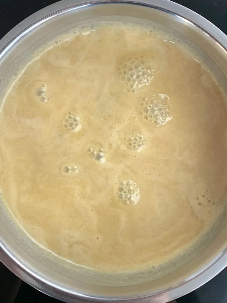 Simmering the spiced toffee sauce