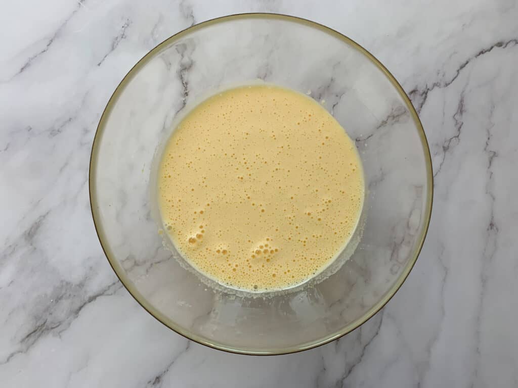 Whipped eggs and sugar that have doubled in volume