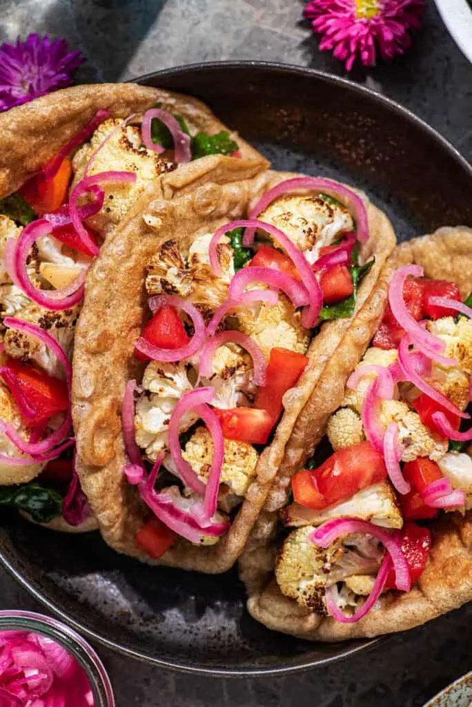 Roasted cauliflower tacos with pickled onions