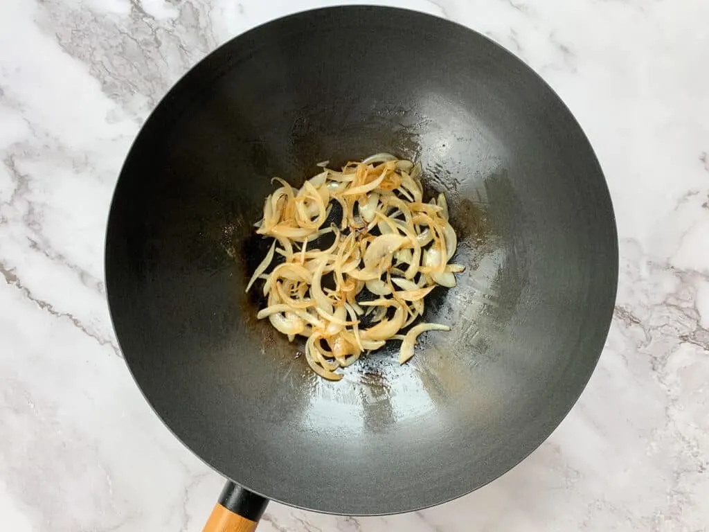 Onions that have been fried in a wok