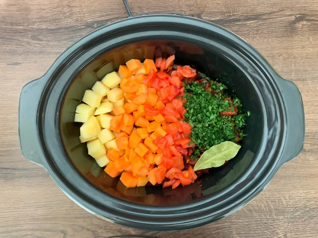 All the goulash ingredients in the slow cooker