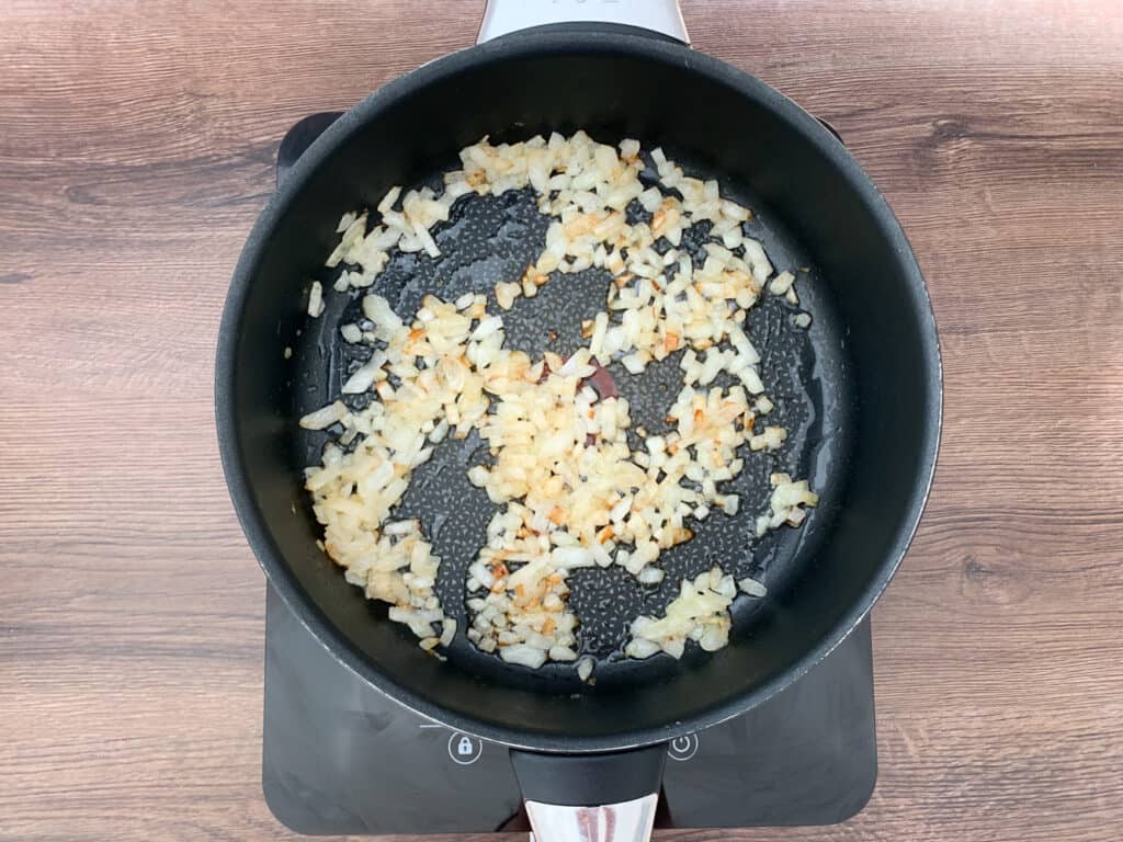Browning onions in a large pan
