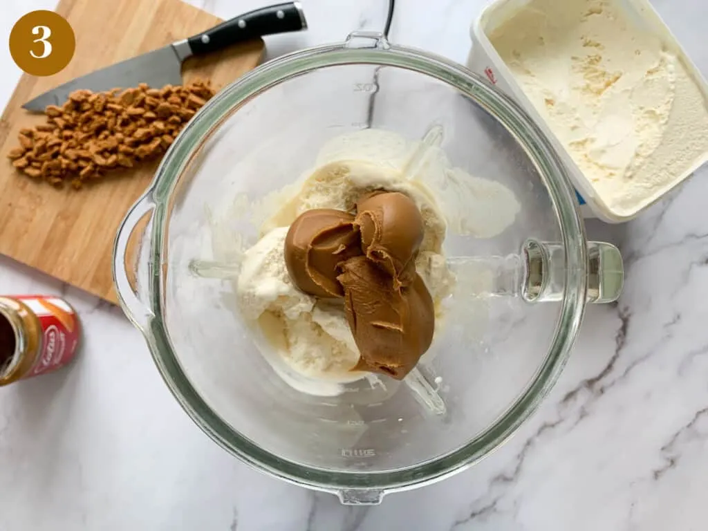 Vanilla ice cream and biscoff spread added to the blender