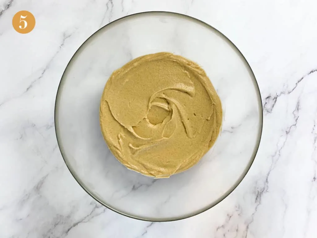 Biscoff spread and mascarpone mixed together in a large bowl