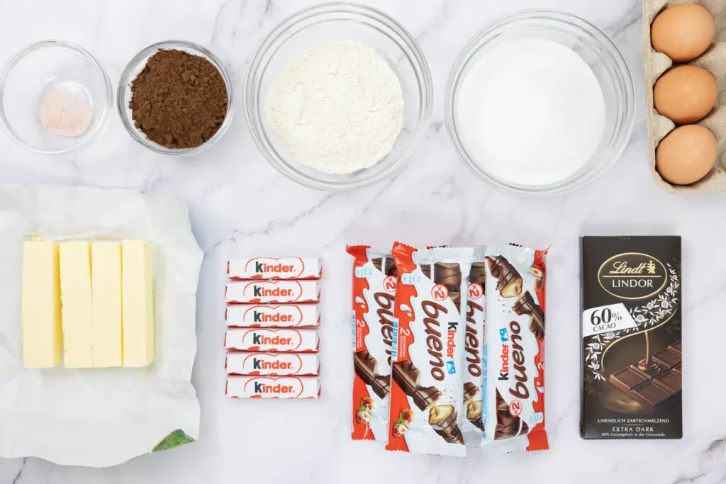 Kinder Bueno Brownie ingredients portioned on a marble counter