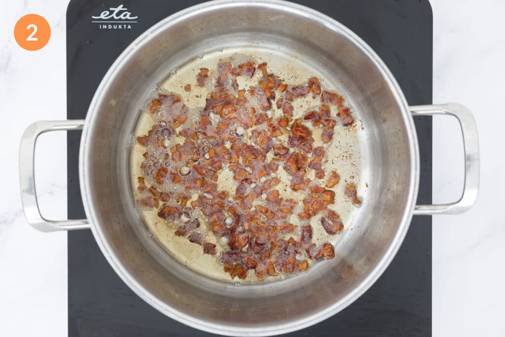 Crispy bacon in a large pot