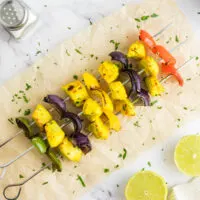 Baked chicken kabobs on skewers