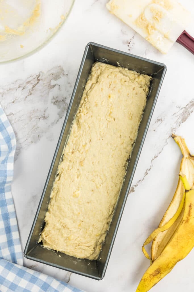 Banana bread without baking soda batter in a loaf pan