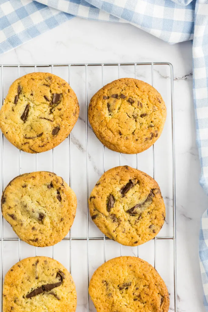 Chocolate chip cookies without brown sugar on a cooling rack