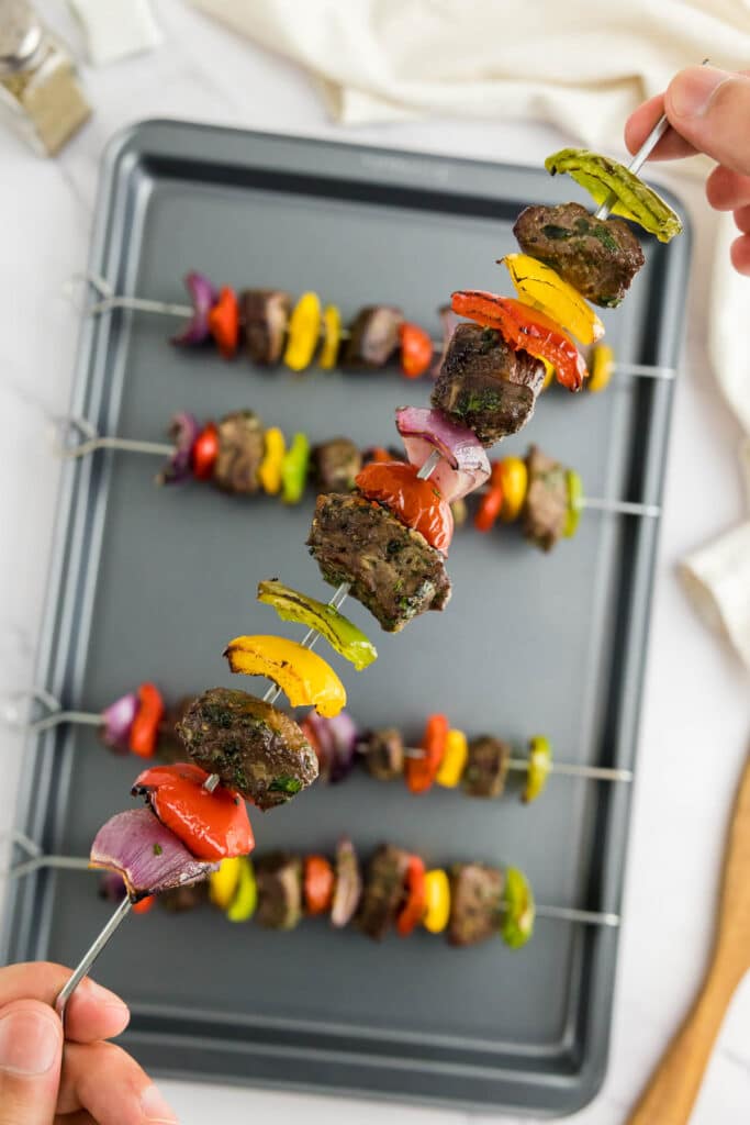 Beef kabob close up: showing the charred beef steak and vegetables