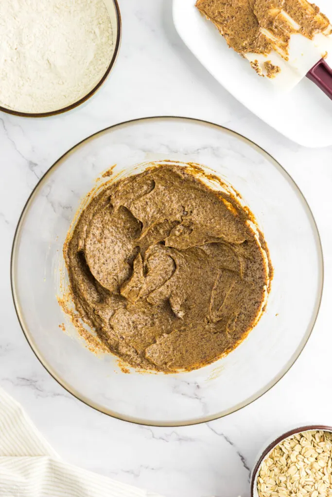 Vegan butter, coconut sugar and vanilla that has been mixed together in a large bowl