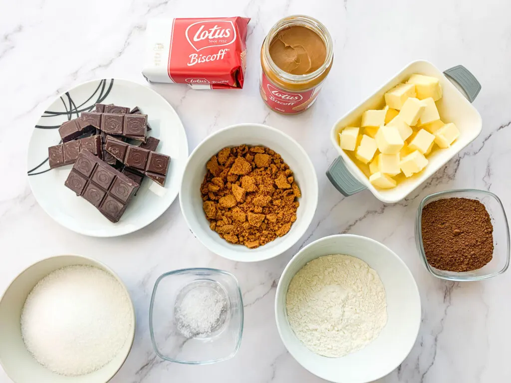 Biscoff brownie ingredients: Biscoff cookie butter, biscoff biscuits, chocolate, butter, cocoa powder, flour, sugar and salt
