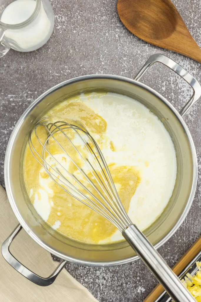Whisking in milk into a roux