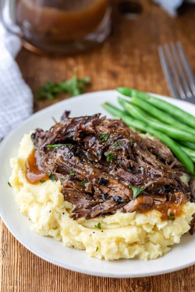 braised and shredded beef on mash potatoes