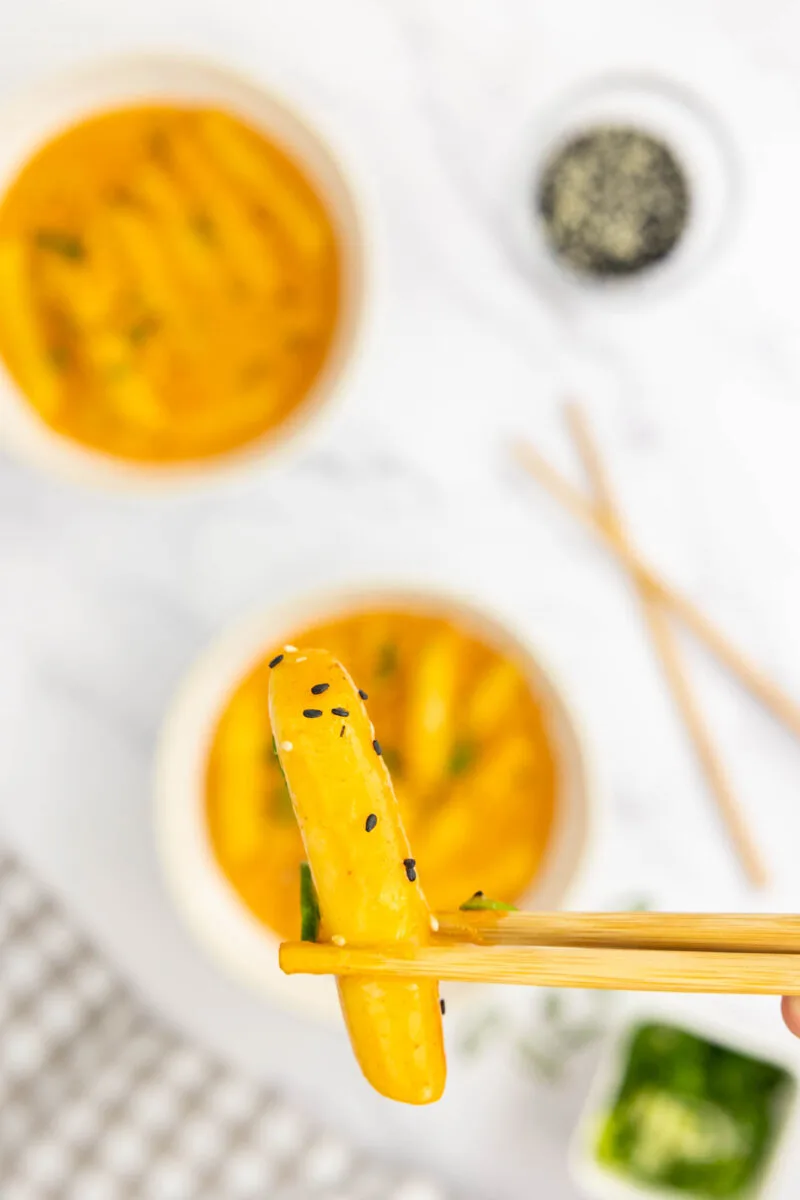 Rose Tteokbooki being picked up by chop sticks