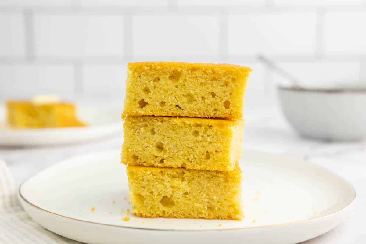 Cornbread stacked on a plate