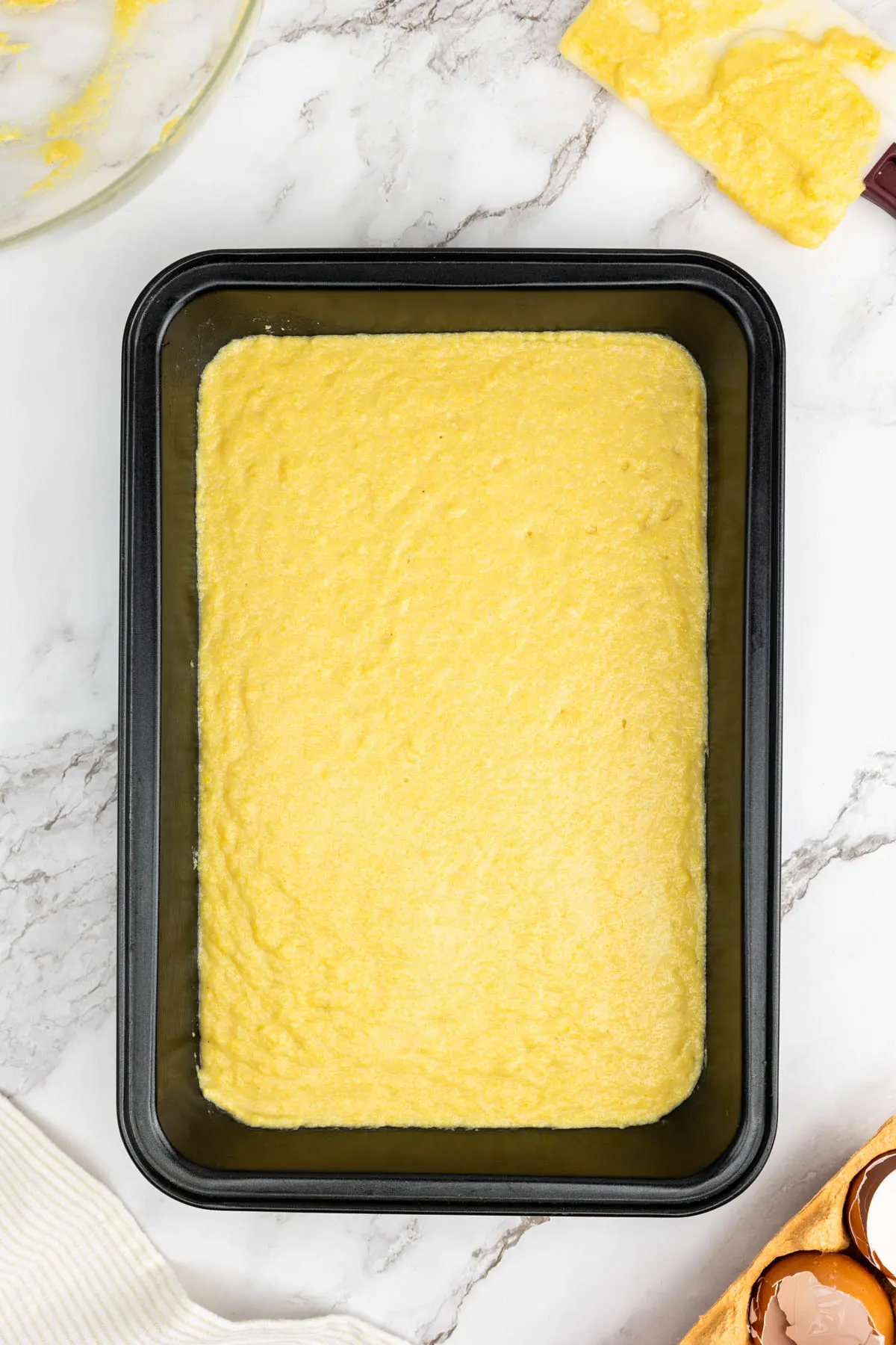 Cornbread batter in a baking tray
