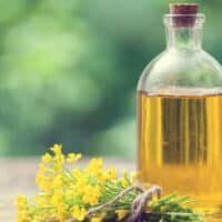 Canola oil in a glass jar.