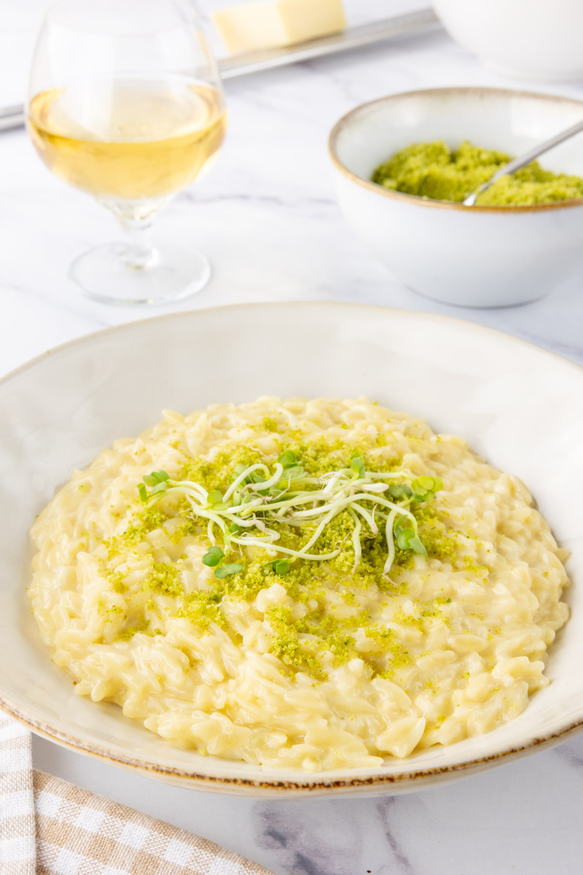 Truffle orzo with a breadcrumb persillade in a bowl.